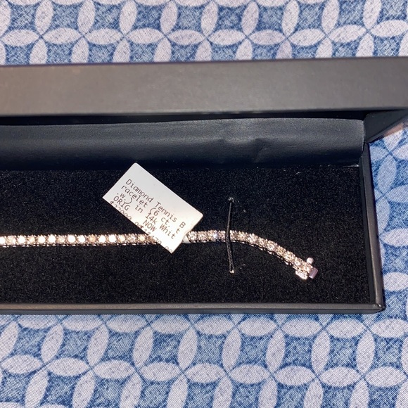 diamond tennis bracelet is set in elegant 14k white gold. - Picture 5 of 10